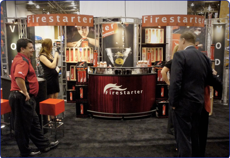 For their 3rd year in a row, our friends at Firestarter rented this Pacifica for the Nightclub and Bar Show in 2010 in Las Vegas and brought their own bar. The booth looks great, the vodka tastes great and they have these cool novelty dispensers that look like little fire extinguishers.